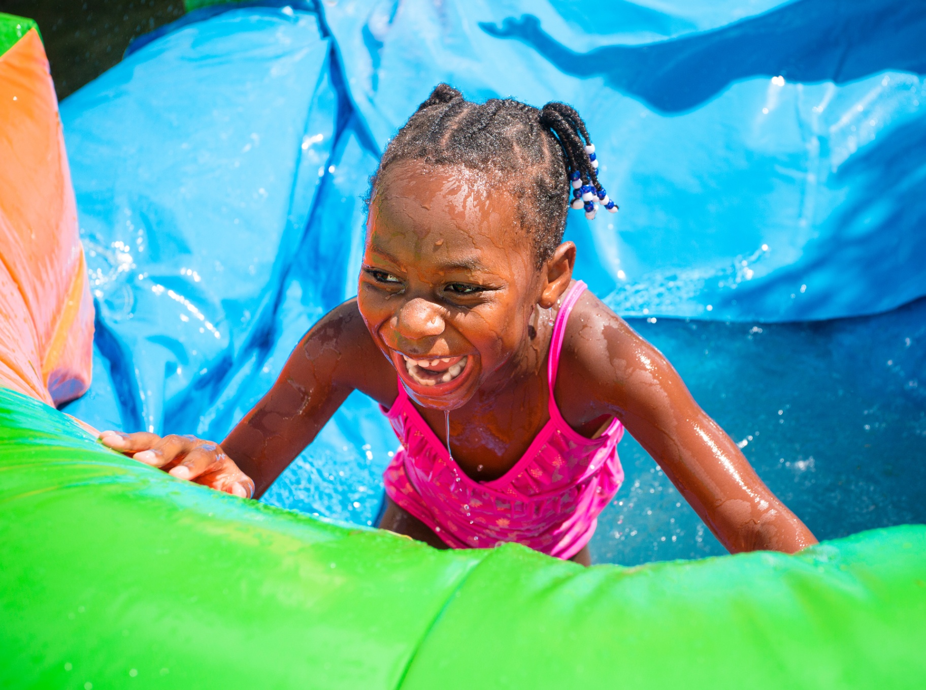 Kids enjoying a water slide rental in Orlando